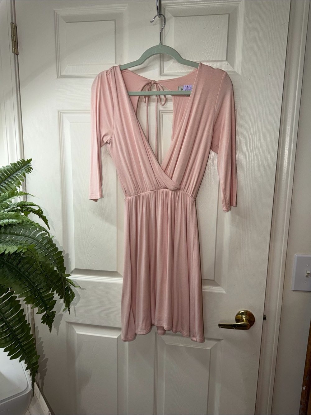 Palest Pink, Dramatic V-Neck duplicated in the back with a delicate tie closure.